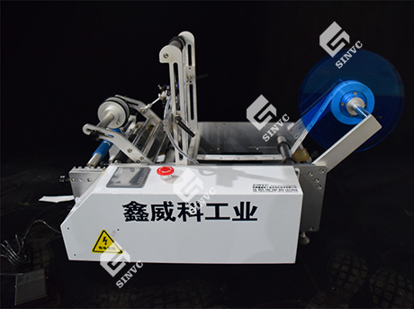 半自動圓瓶貼標(biāo)機(jī)